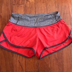 Lululemon Speed Shorts Size 2, Coral with dark gray trim
